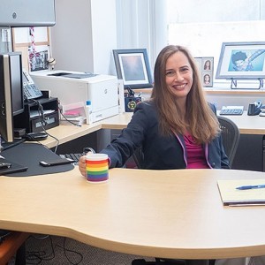 Dr. Romero at desk